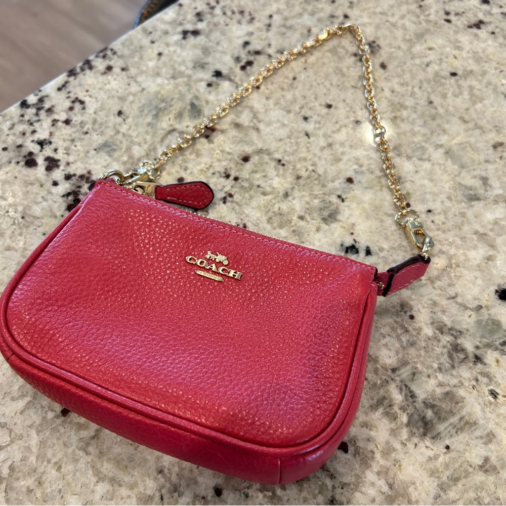 Coach pink leather wristlet with gold chain